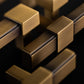 Close-up of Dark Brushed Brass Bailgate Handles