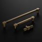 Set of bronze cabinet handles on a dark background